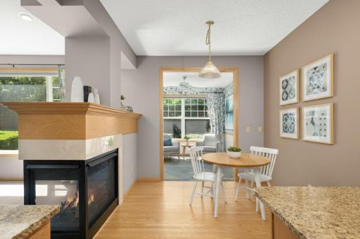 The three-sided fireplace adds fabulous ambiance all year round.
