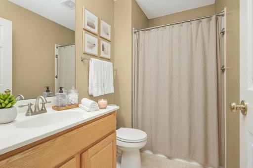 The third bathroom also features a shower and is just off the third bedroom.