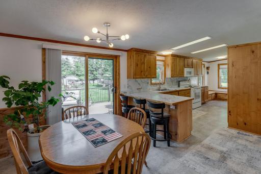 Dining room leads out to the lakeside deck.