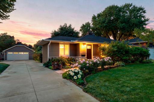 The seller removed the original attached garage and added an oversized 2 car garage with a cement driveway.