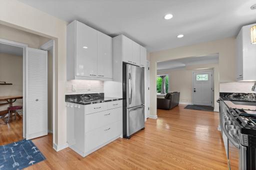 Widening the entry from the living room to the kitchen opens the kitchen up and is very spacious.