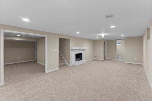 The entire lower level was painted in 2026. The 3/4 bath is in the far-right corner of the picture.