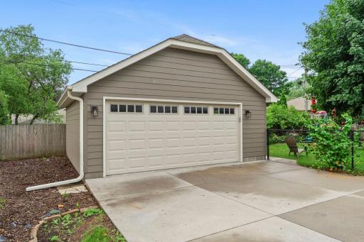 The 2+ car garage also has James Hardie siding and light fixtures that complement the one on the front of the house. The inside still looks like new.
