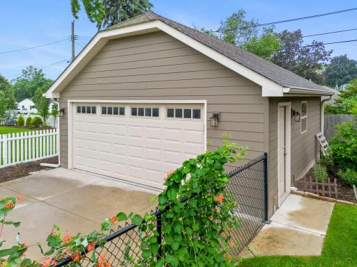 There is a pull-down ladder with extra storage in the garage.