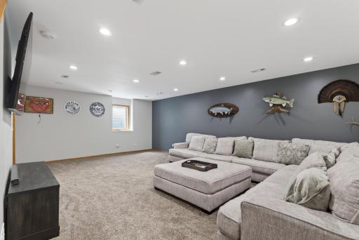 26' x 17' lower lever living with bright recessed lighting offers flexible options and plenty of room to spread out.