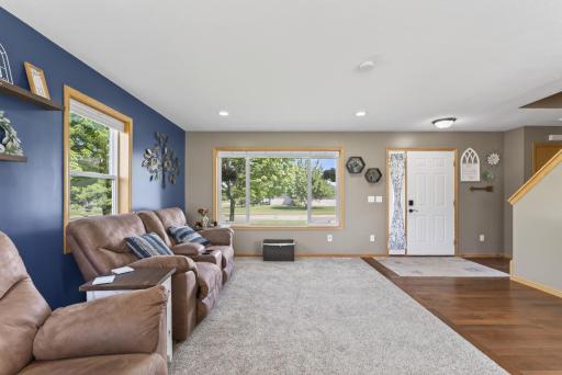 Large windows anchor the spacious living room.