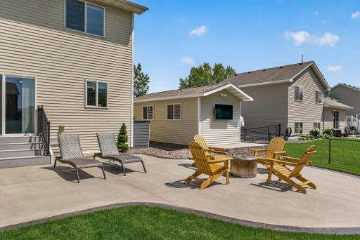 Plenty of room on your 32' x 20' concrete patio for a firepit area, lounging spot, and eating area.