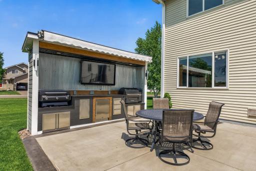 Custom built entertainment/grill center.