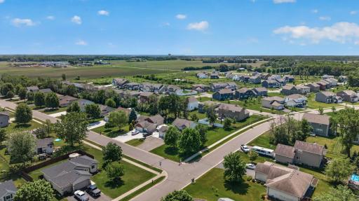 Outdoor living at its best with an entertainment and grill center set within a fully landscaped, sidewalk-connected neighborhood.
