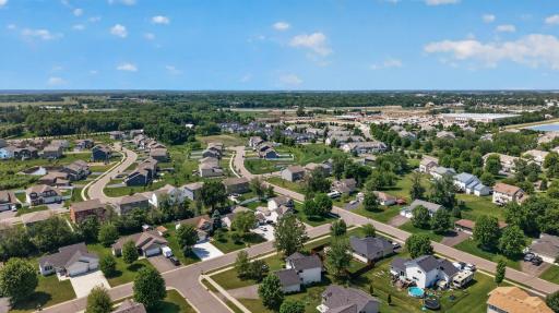 A well-cared-for exterior featuring lush landscaping, irrigation, and abundant outdoor space to enjoy in every season.