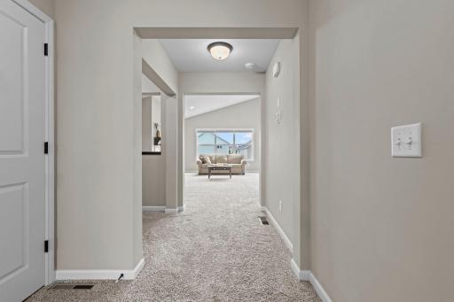 Hallway to the Living Room, Flex Space, Dining Area, and Kitchen!