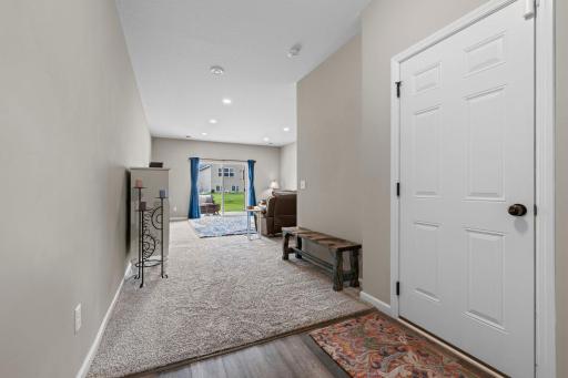 Hallway to the Family Room, Secondary Bedroom, Laundry Room, Patio, and more!
