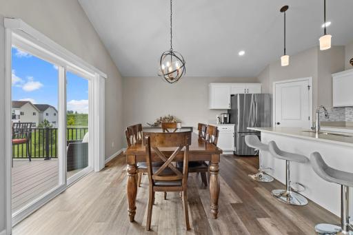 Dining area with view of the backyard and new 12 x 12 deck