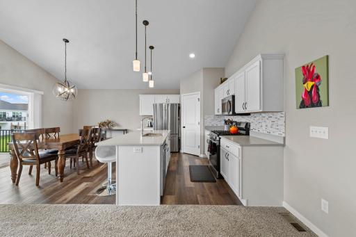 Informal Dining area off of the kitchen. Maintenance free LVP waterproof flooring