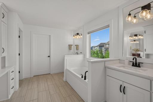 Here is an alternate view of the primary bathroom en-suite.