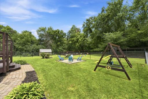 Firepit and play structure stay with the property.