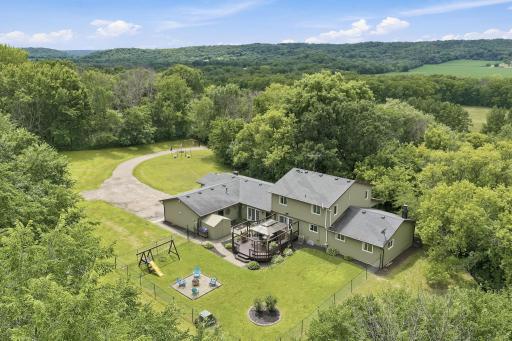 Private setting amongst the wooded 4+ acres.