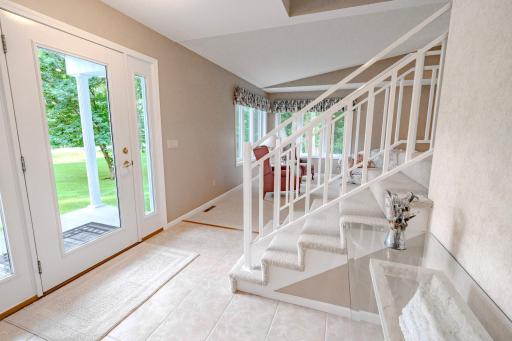 Foyer and view outside through welcoming front door