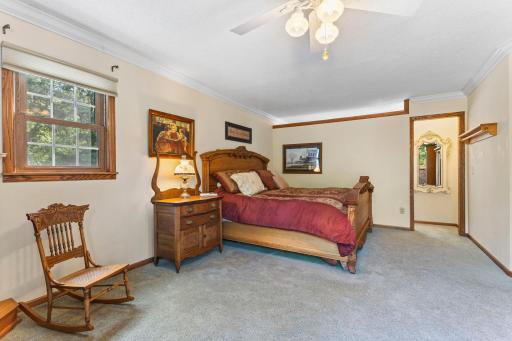 Large primary bedroom with a private deck.