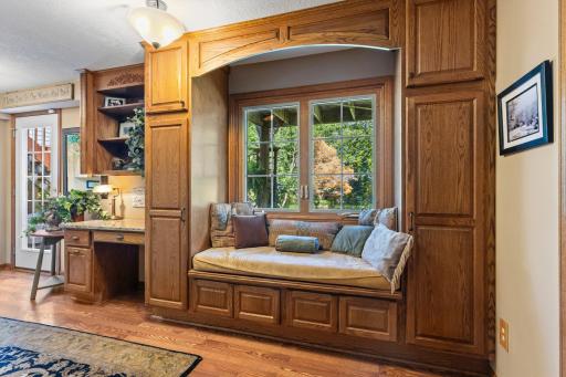 Kitchenette features a cozy reading nook and great storage for books, games, etc.