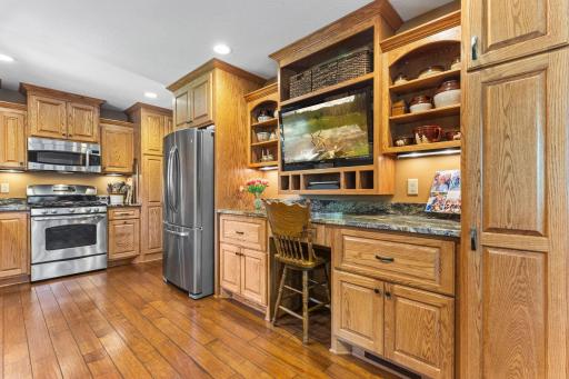 Custom cabinets in kitchen with soft-close hardware.