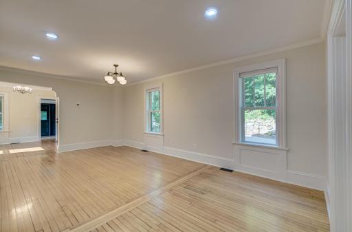 The middle room can be set up as both informal eating area and living room.