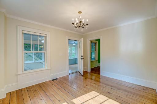 Original pine floors bring a warm hue to the front room.