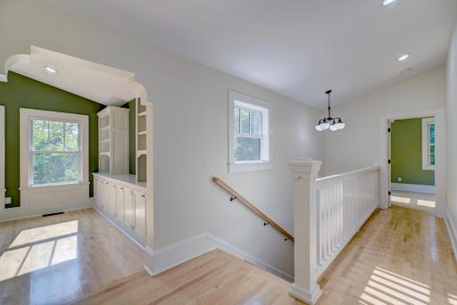 The upper level is all new construction with gorgeous solid-maple floors.