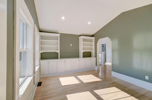 The many softly vaulted ceilings in the upper level add a feeling of vertical spaciousness.