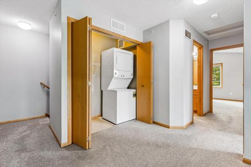 Convenient laudry space with easy access to the two bedrooms.