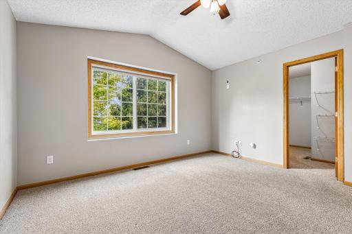 Stunning primary bedroom with a HUGE walk in closet!