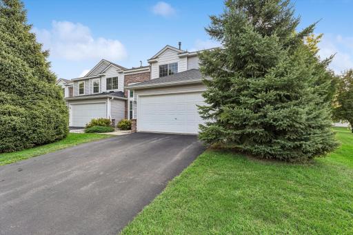 Two car garage allows for ample storage and parking space. There is additional guest parking nearby.