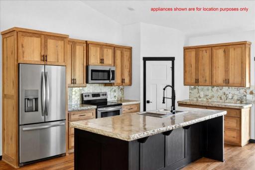 This photo has been virtually staged. Choose from a variety of colors, cabinets, trims, etc. All photos are from a similar model home.
