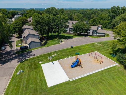 The new park sits just steps from the home, surrounded by generous green space.