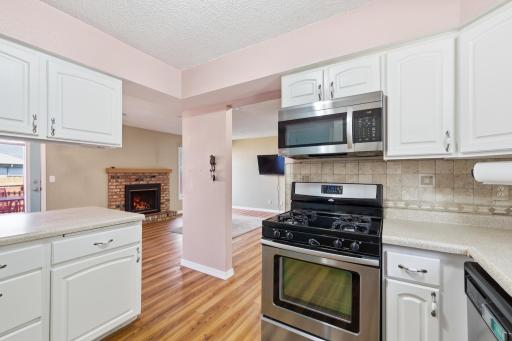 Generous countertop space pairs with a convenient passthrough to the dining room, perfect for effortless serving and entertaining.