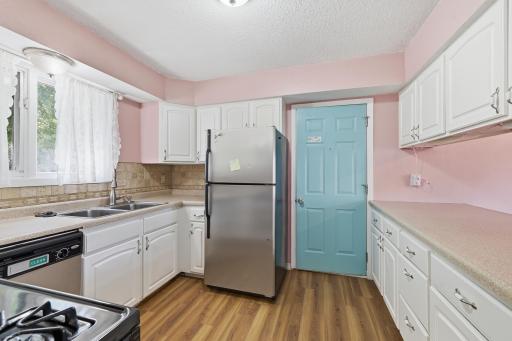 The garage connects directly to the kitchen, making grocery unloading quick and convenient.