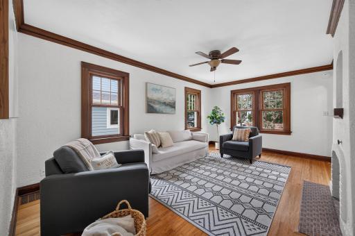 Living RoomNewer replacement windows throughout and hardwood flooring