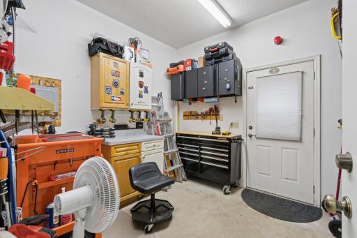 3459 166th Ln NW - Attached 3 Car Garage with Finished Workshop Space