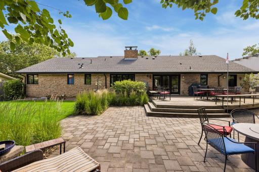 Incredible backyard with giant deck and paver patio. Natural gas lines are plumbed to both the grill and the firepit.