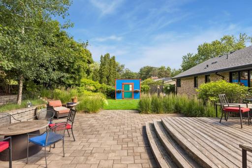 Incredible backyard with giant deck and paver patio. Natural gas lines are plumbed to both the grill and the firepit.