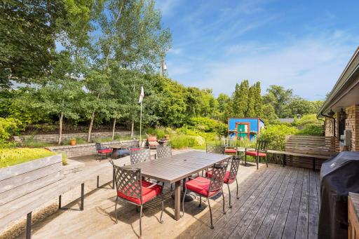 Incredible backyard with giant deck and paver patio. Natural gas lines are plumbed to both the grill and the firepit.