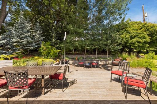 Incredible backyard with giant deck and paver patio. Natural gas lines are plumbed to both the grill and the firepit.