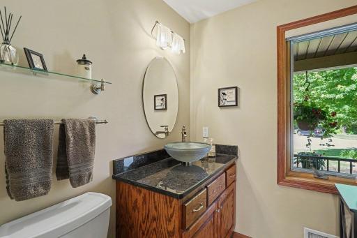 Main floor half bath featuring Minnesota granite.
