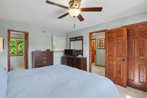 Main bedroom features new light/fan fixture and new carpet.