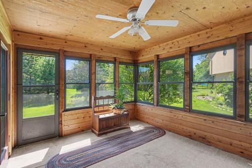 An additional three-season porch adjacent to the living room.