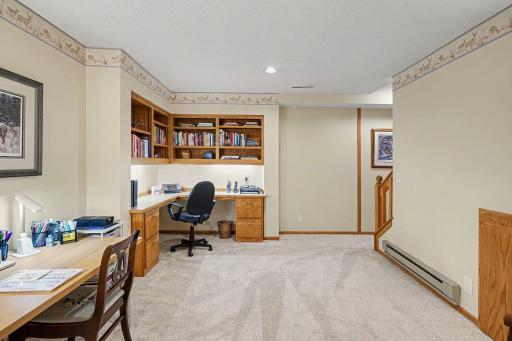 Office features brand new carpet, and a built-in desk with under-mount lighting.