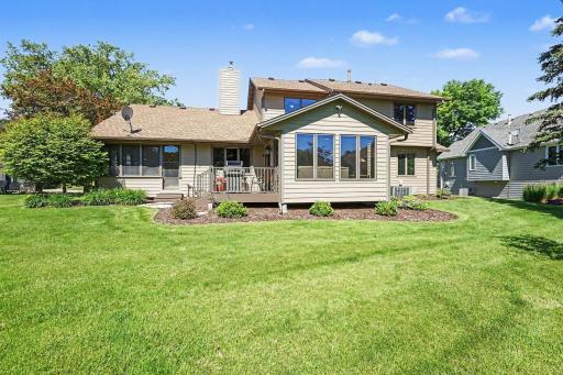 The exterior features easy-to-maintain landscaping highlighted by beautiful perennial shrubs, in-ground sprinkler system and drip irrigationÂ for the landscaping around the base of the house.