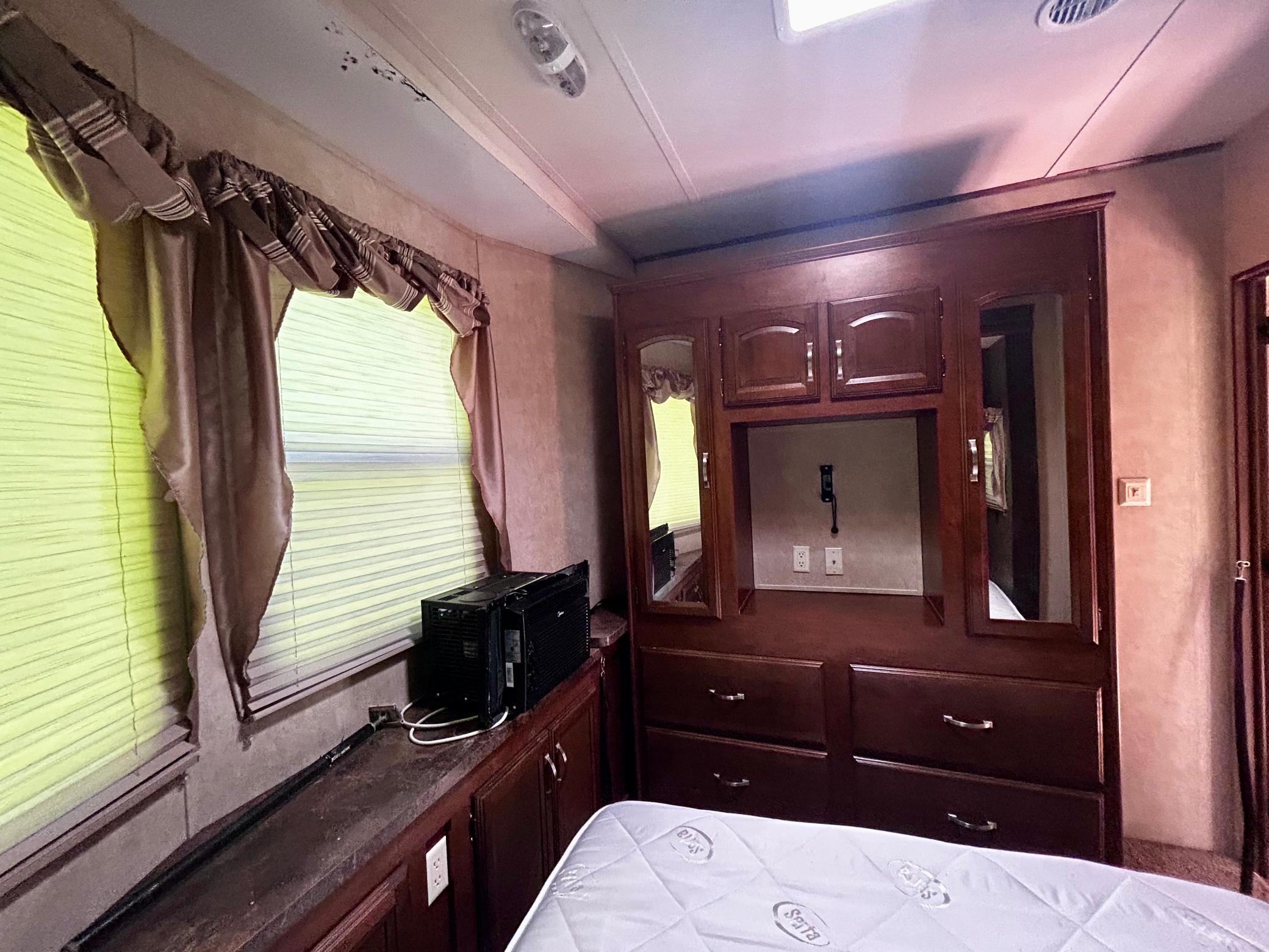 Camper One - Secondary room space with TV hook-up and plenty of storage