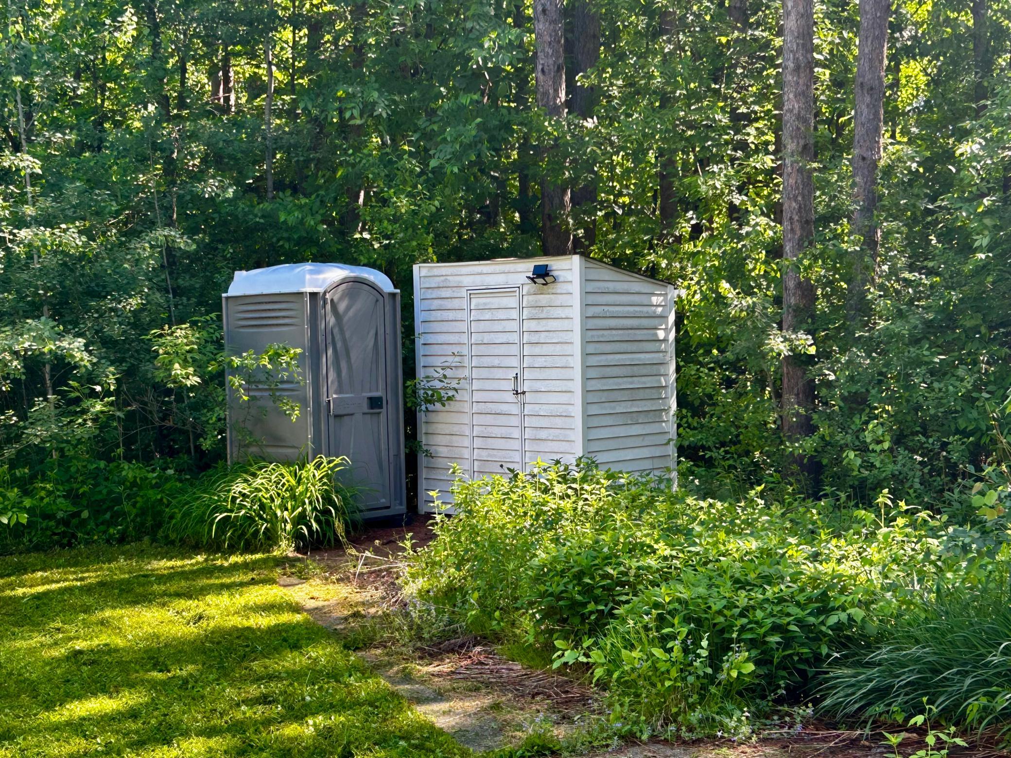 Outhouses - If the two bathrooms are enough, there is an outdoor shower and an outhouse located on the property