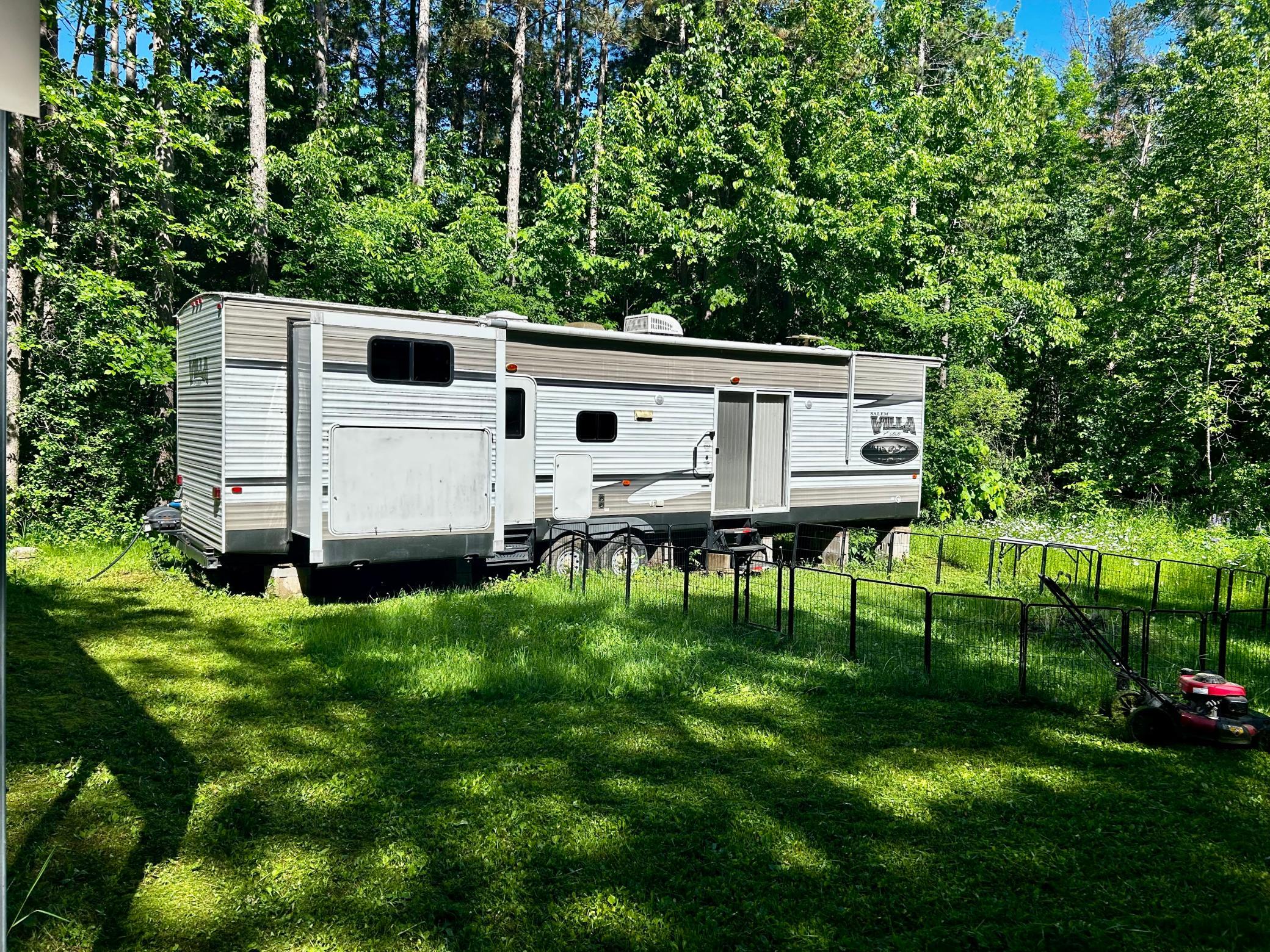 Welcome to your new wooded lot retreat. Nestled on a peaceful one-acre wooded lot, this charming retreat offers the perfect blend of privacy, nature, and outdoor living. Surrounded by mature trees that provide abundant shade and seclusion.